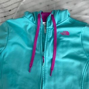 Teal and purple North Face zip-up sweatshirt